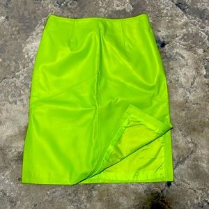 Neon green leather pencil skirt with lining. Size 8 UK, 4 US